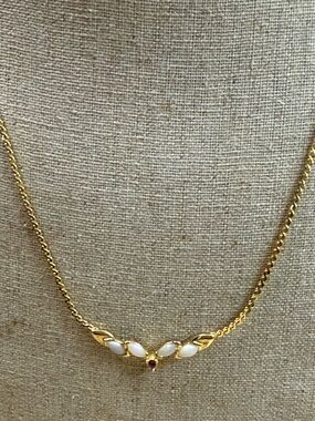 Fashion Jewelry Gold Leaf Necklace with White Enamel and Ruby Accent